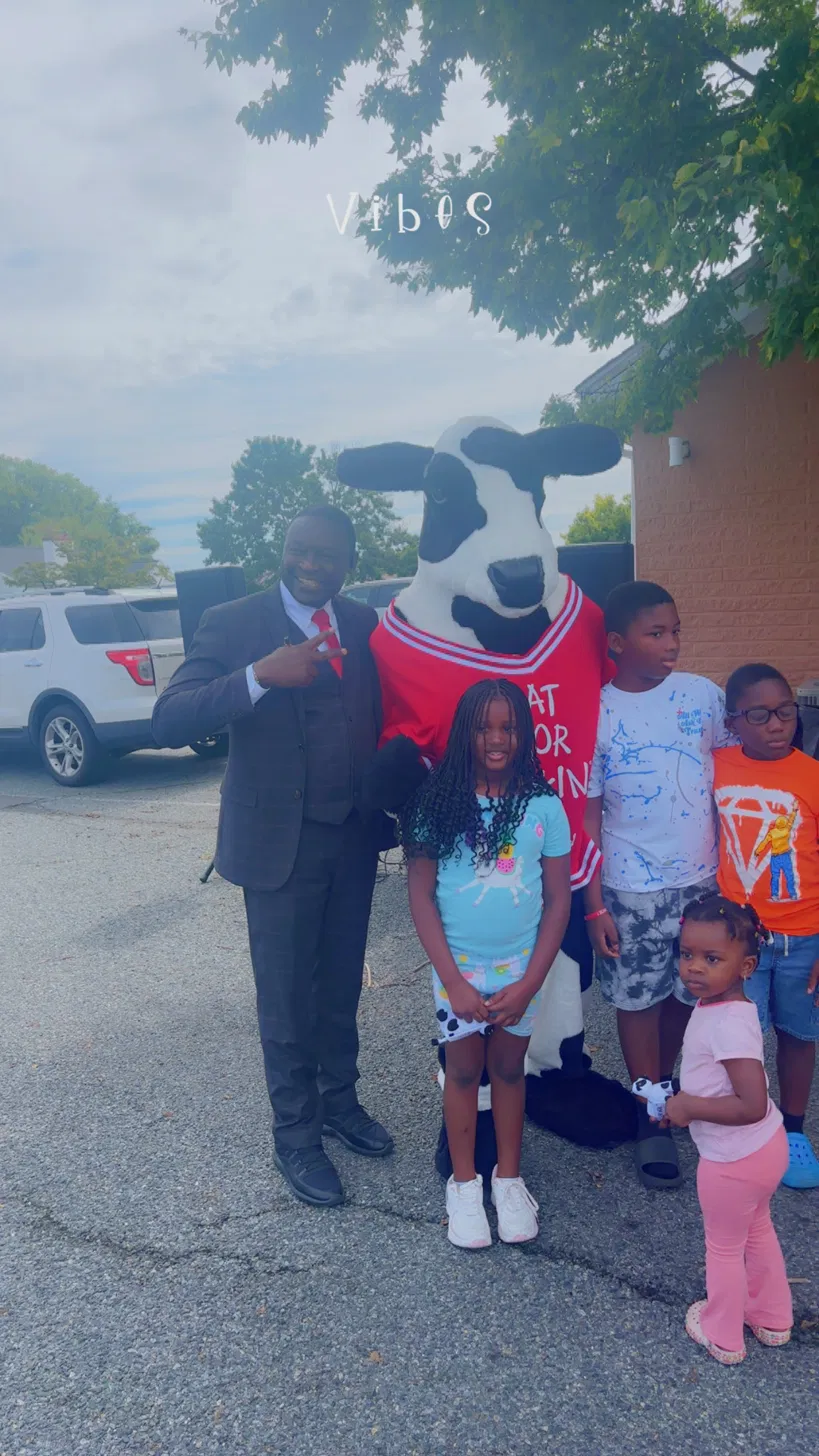 Chick-fil-A mascot with family