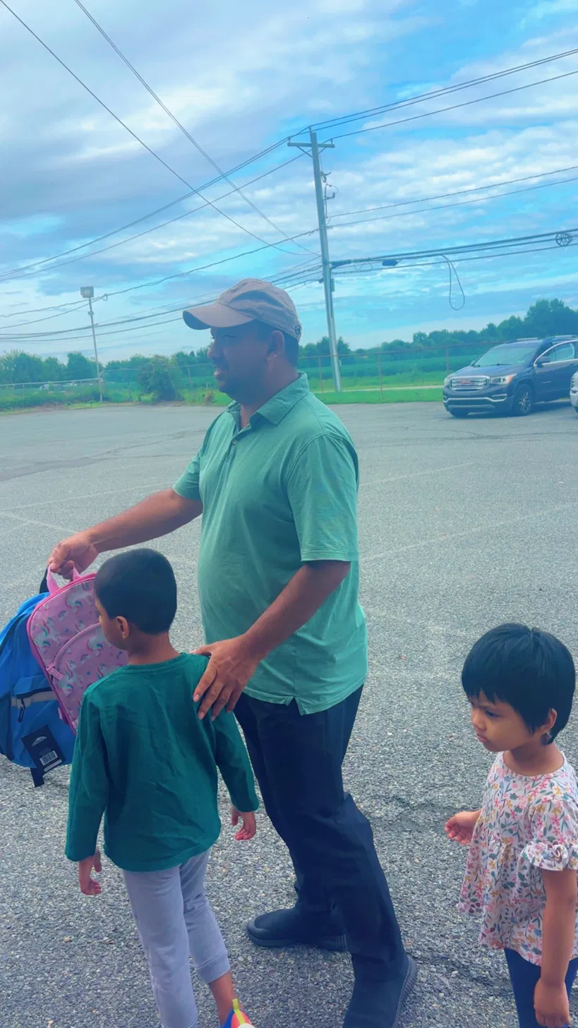 Volunteer with backpacks